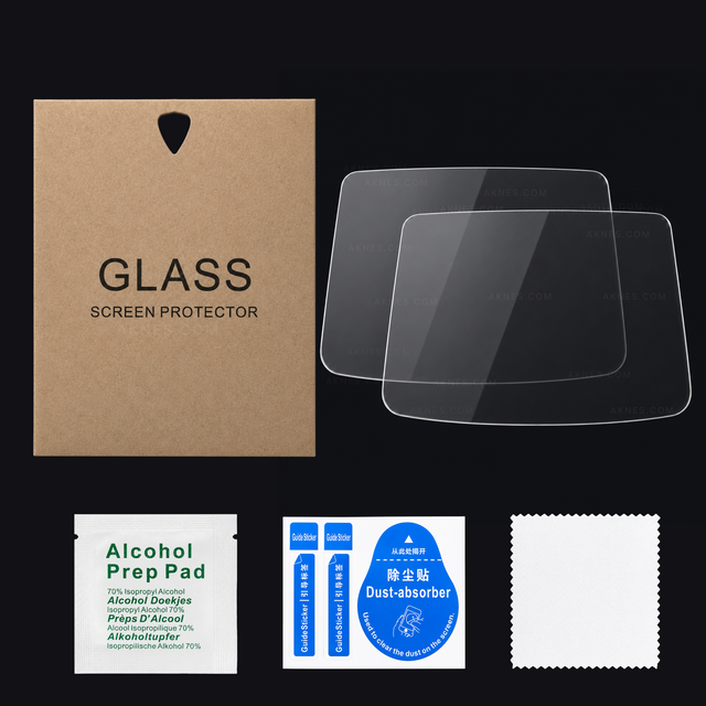 A set of screen protector accessories on a black background, including two clear glass screen protectors, a brown kraft paper bag labeled 'GLASS SCREEN PROTECTOR,' a white alcohol prep pad packet, a blue dust absorber packet, and a white microfiber cloth.